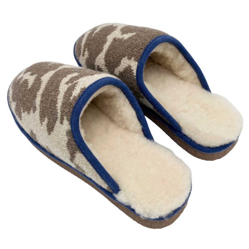 cosy cow print slippers lined with real sheepskin
