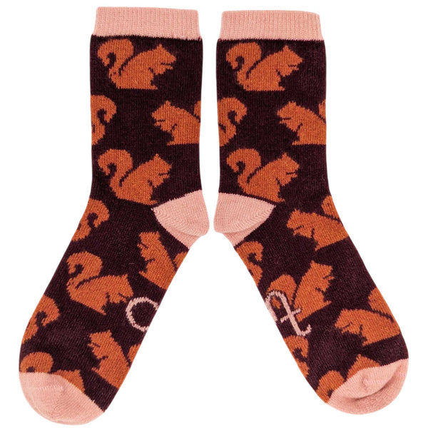 Pair of socks with squirrel pattern on a white background