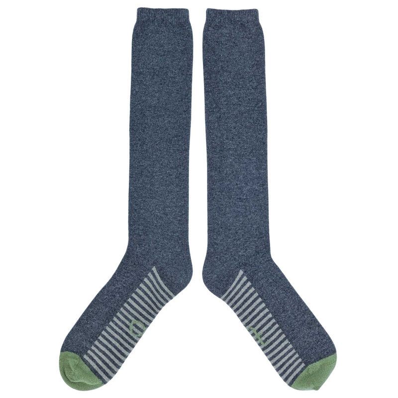 Pair of blue knee-high socks with green toes and heels on a white background