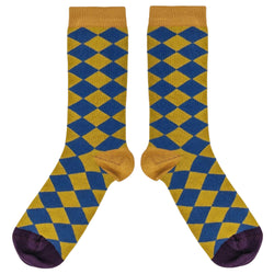 A pair of socks featuring a green and blue diamond pattern, on a white background