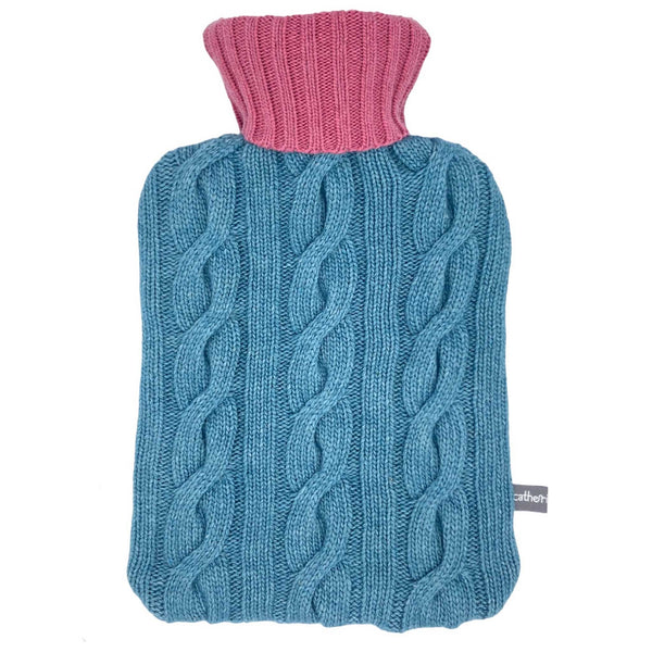 cashmere mix hot waster bottle with a cable pattern in jade with a pink neck