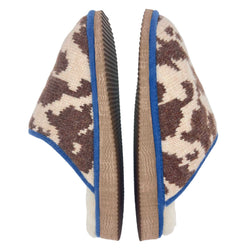 cosy cow print slippers lined with real sheepskin